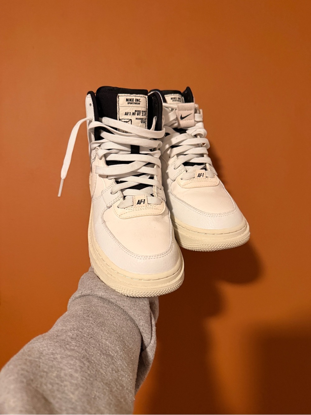 Nike Women’s White and Black Mid-Top Sneakers